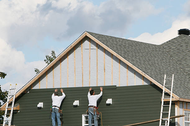 Professional Siding Installation technician working in Keller, TX